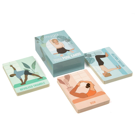 The Myga Yoga Pose Cards set, including the retail box and four individual cards spread out. The cards feature illustrations of yoga poses, including Revolved Triangle, Bow Pose, and Butterfly Dolphin, showcasing the educational and instructional set.