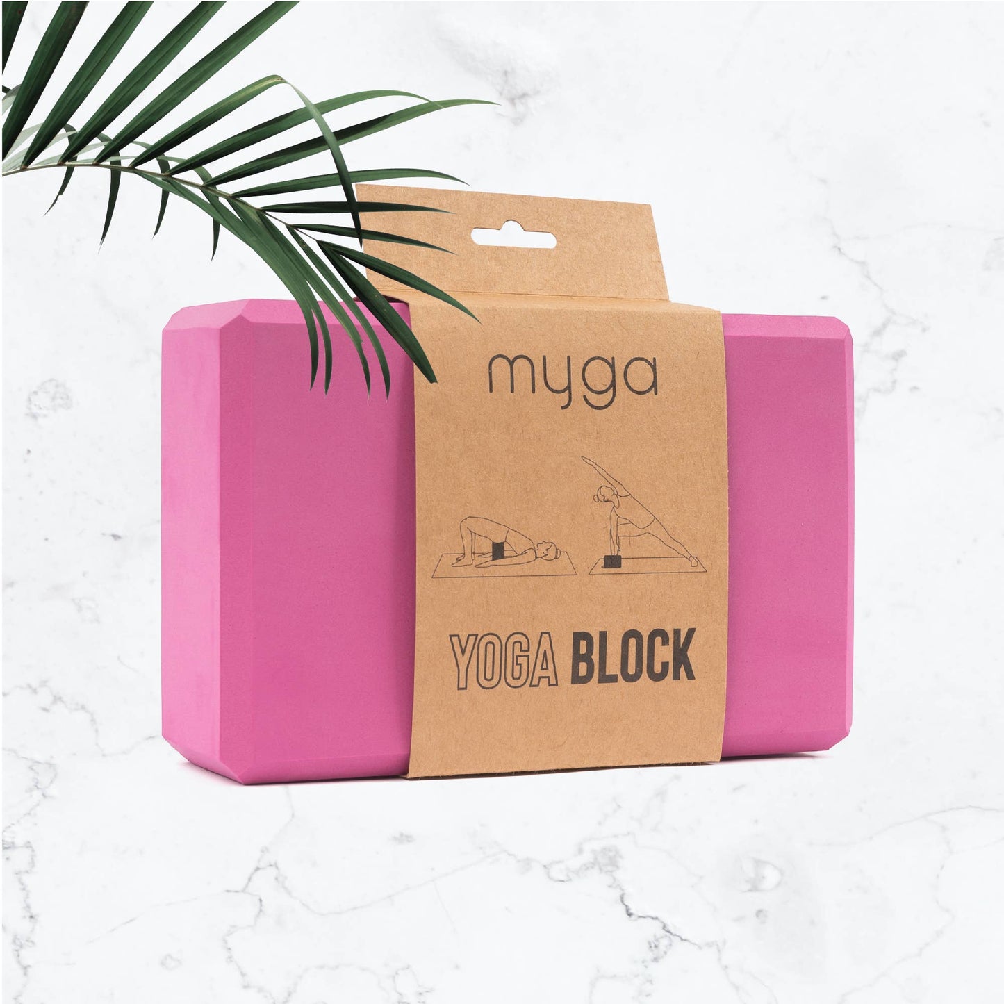 Pink yoga block with brown packaging labeled 'myga' on a light gray background.