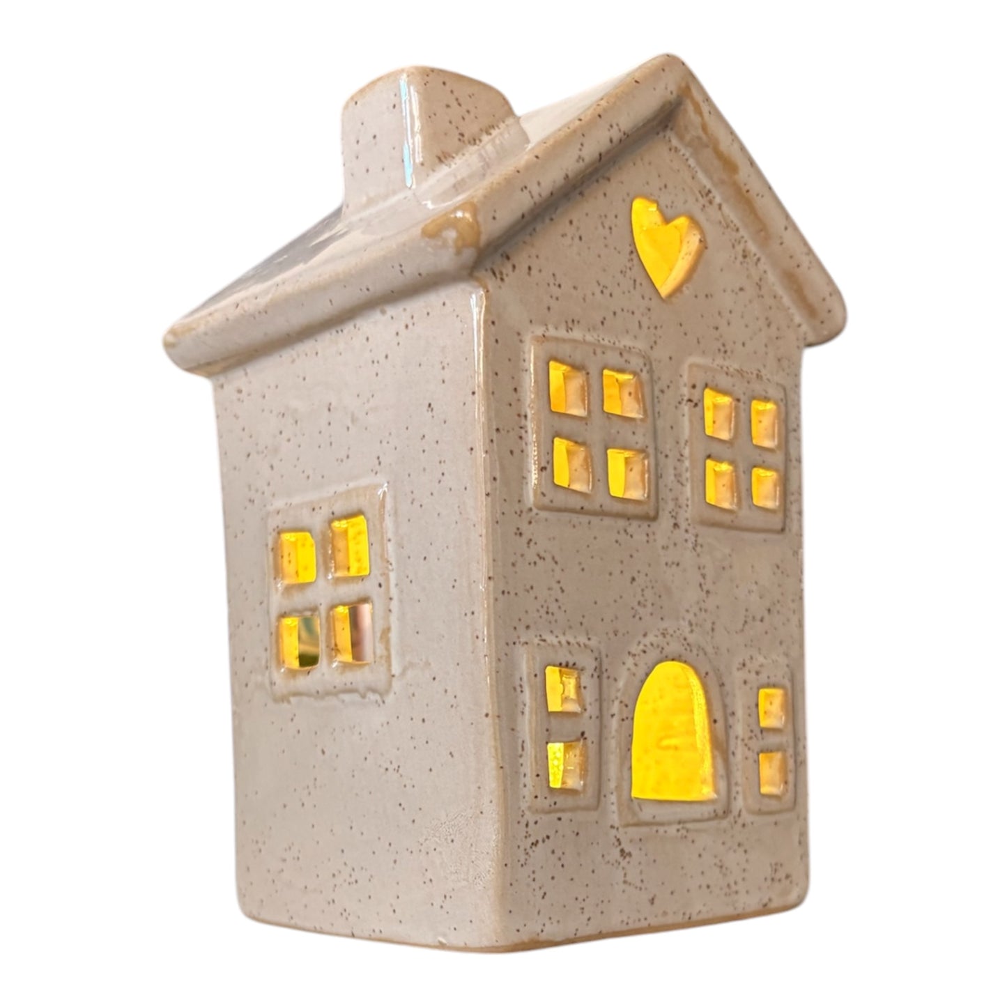 Tea light holder, house shaped decor, side view. 