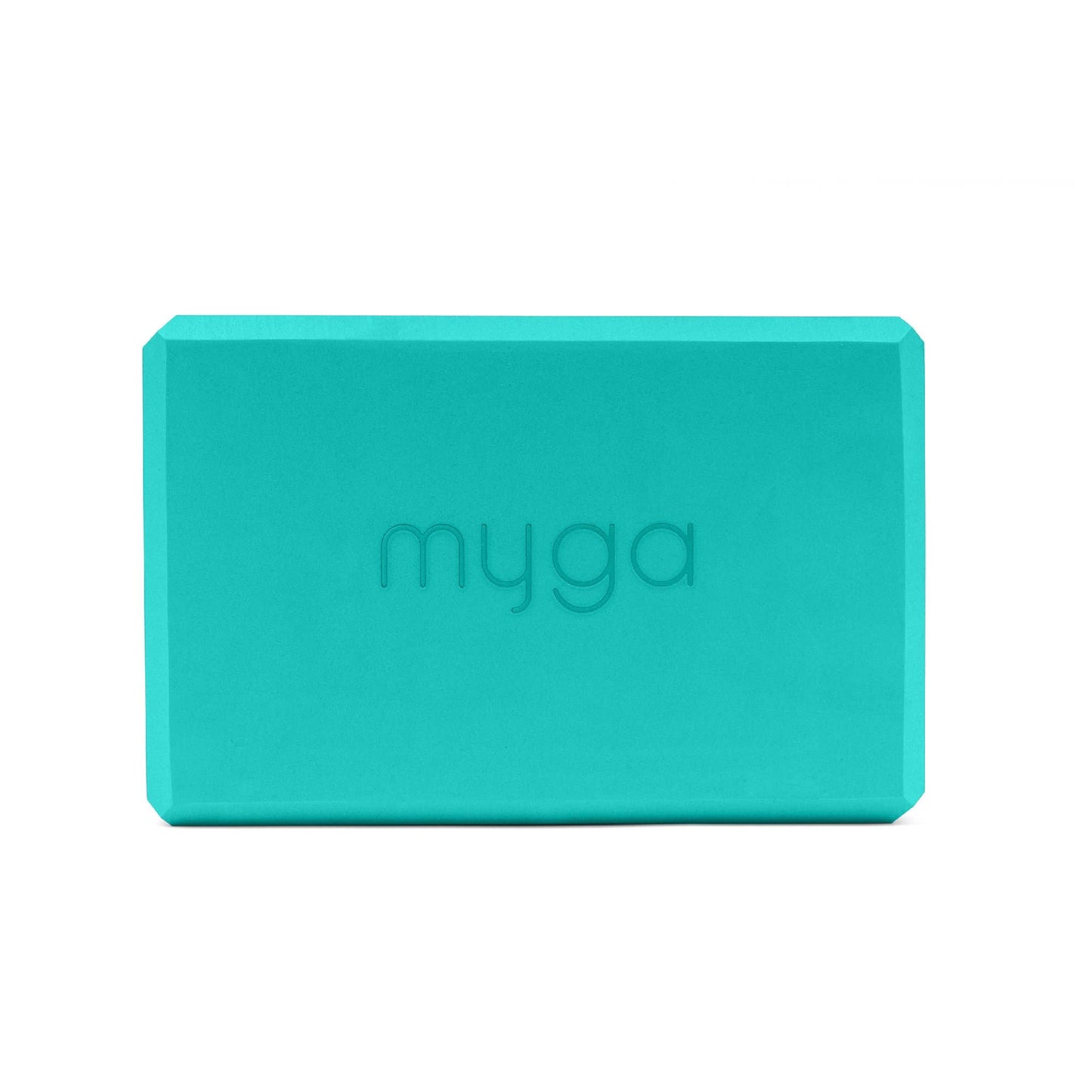 Turquoise yoga block with 'myga' branding on a white background