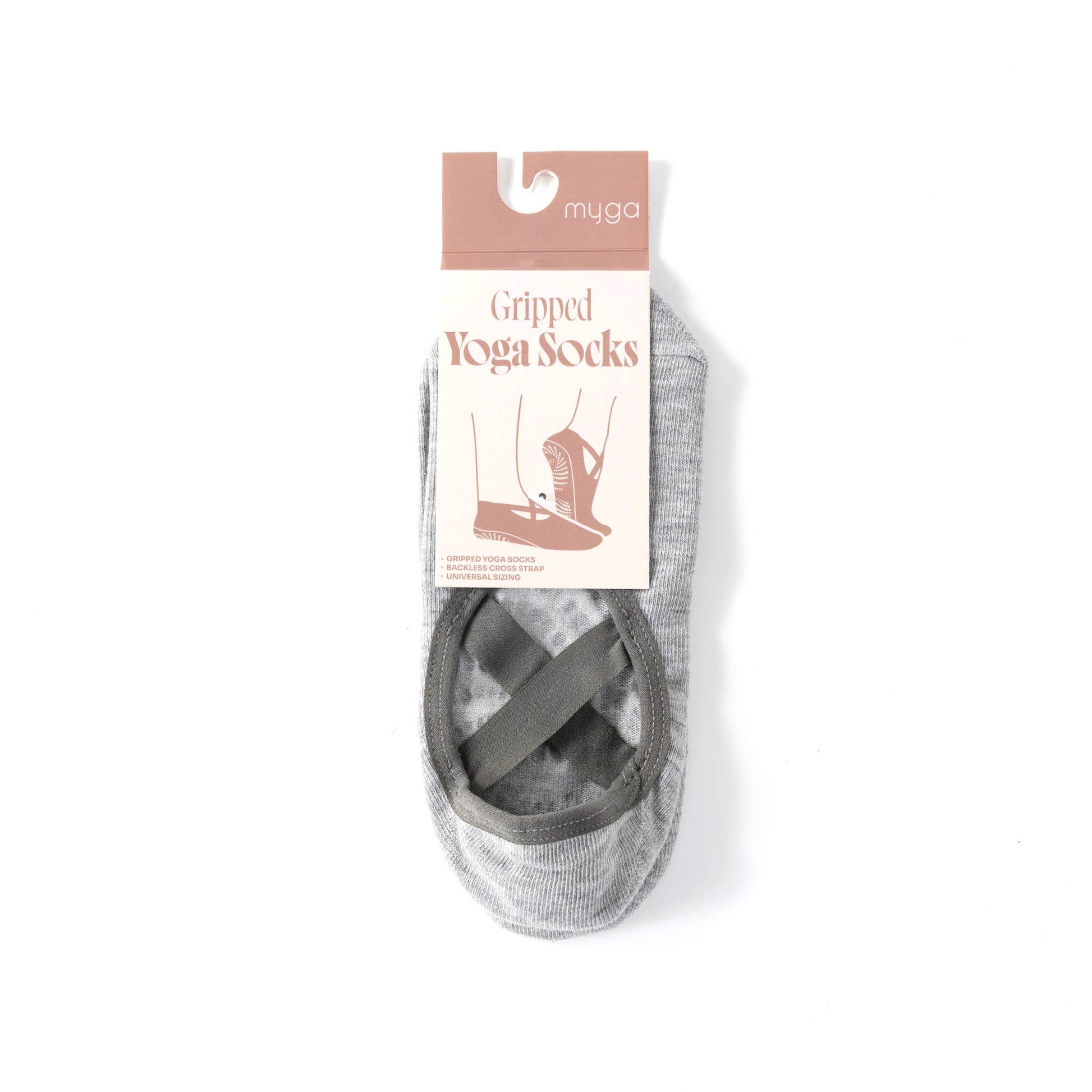 Retail packaging for Myga Gripped Yoga Socks in light grey. The sock features an open arch with criss-cross elastic straps and is packaged with a cardboard sleeve showing the product name and a yoga illustration.